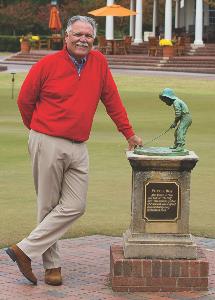 Bob Farren Jr., CGCS is pictured with Pinehurst's famous Putter Boy sculpture.